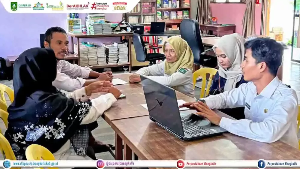 Pembinaan Perpustakaan dan Pendaftaran NPP di SMAN 2 Bukit Batu